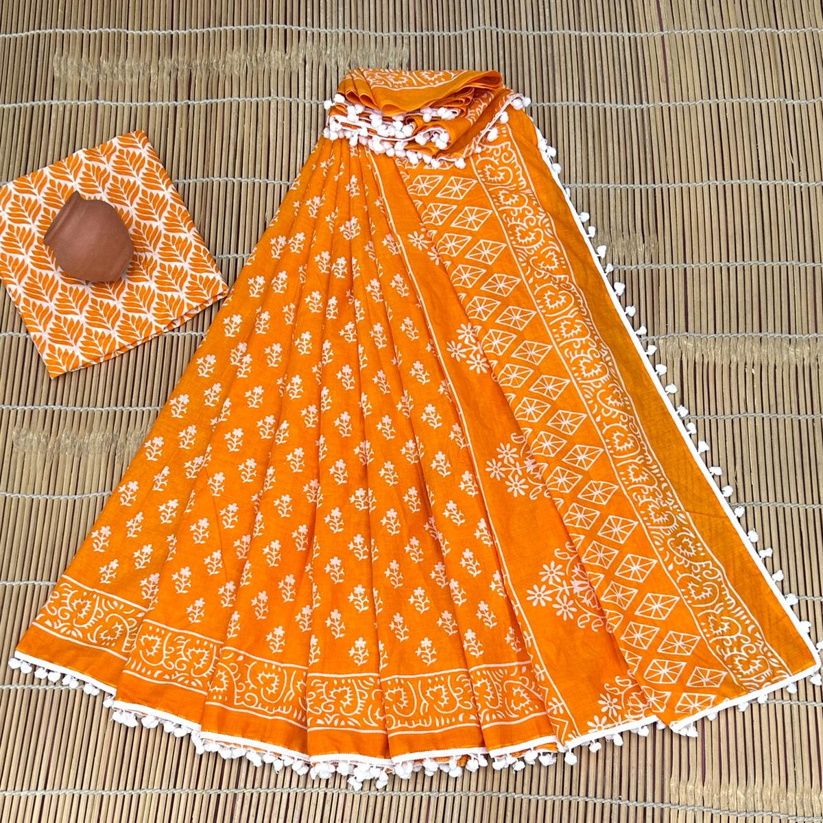 Vivid Marigold Orange & Dense White Floral Sprig Buti Bagru Block Print Soft Cotton Mulmul Saree with Pom Pom